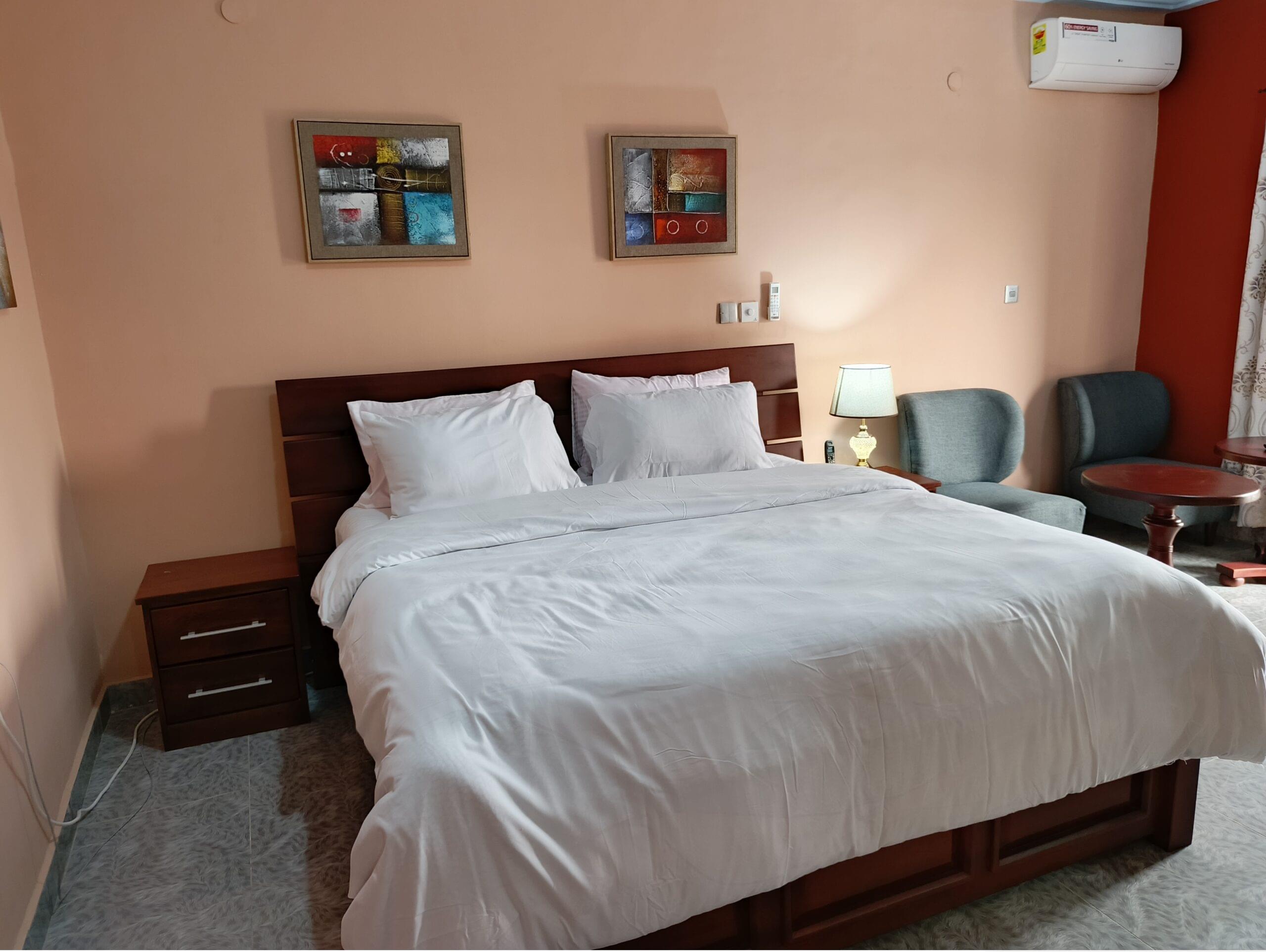 The Premium Plus Room features a private balcony for fresh air and a complimentary coffee set. Perfect for guests who want a relaxing morning routine in East Legon Hills.